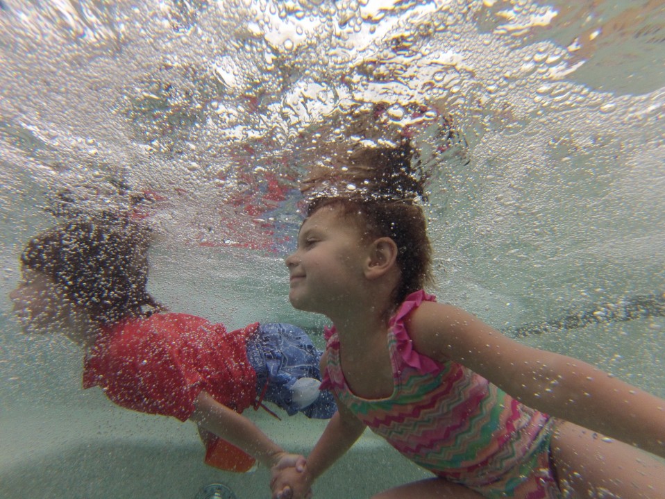 Kids having fun and playing after their swim lessons.