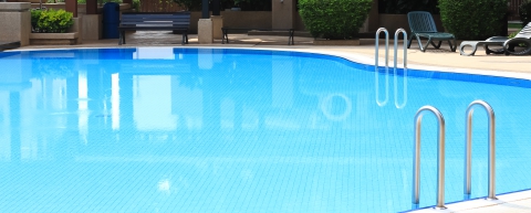 Clear warm waters in our backyard swimming pool.
