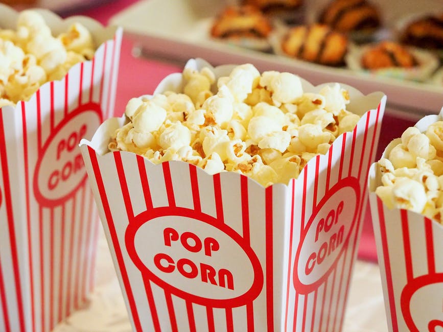 Family movie fun eating popcorn