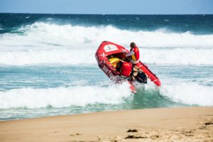 lifeguard beach rescue with raft